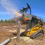 JD 333 grinding trees.png